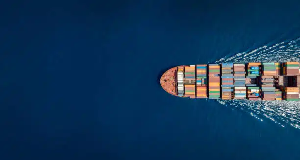 Top view of cargo ship sailing to Djibouti from China
