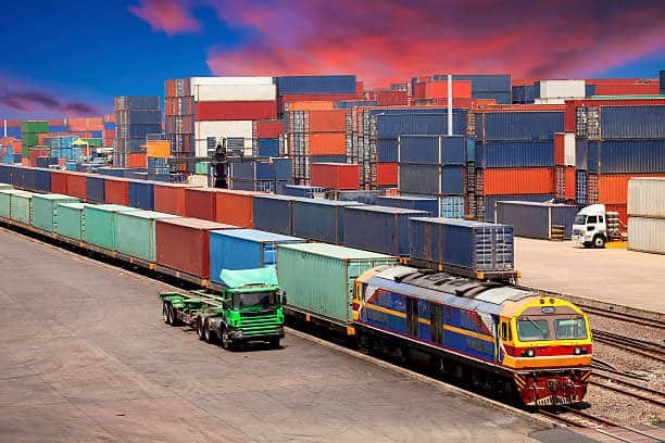 Intermodal freight transport with train and containers for shipping from China to Spain.
