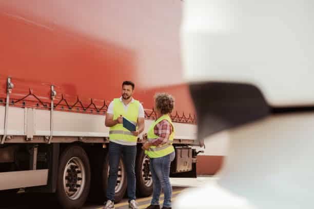 Logistics team preparing goods for land transport from China to Brazil