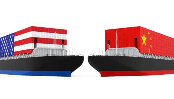Two cargo ships representing USA and China trade routes