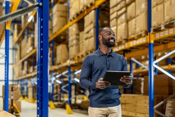 Brazilian logistics specialist checking inbound goods from China