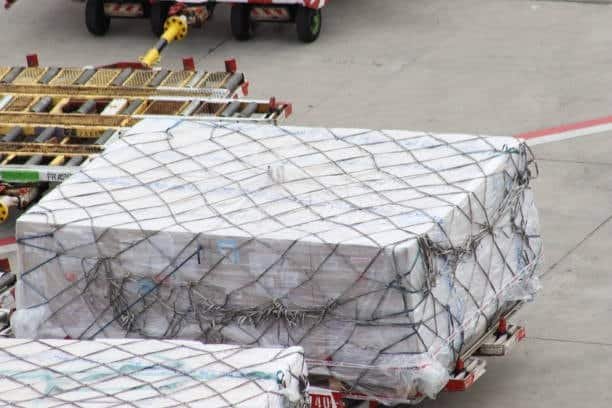 Tightly wrapped cargo pallet prepared for air transport