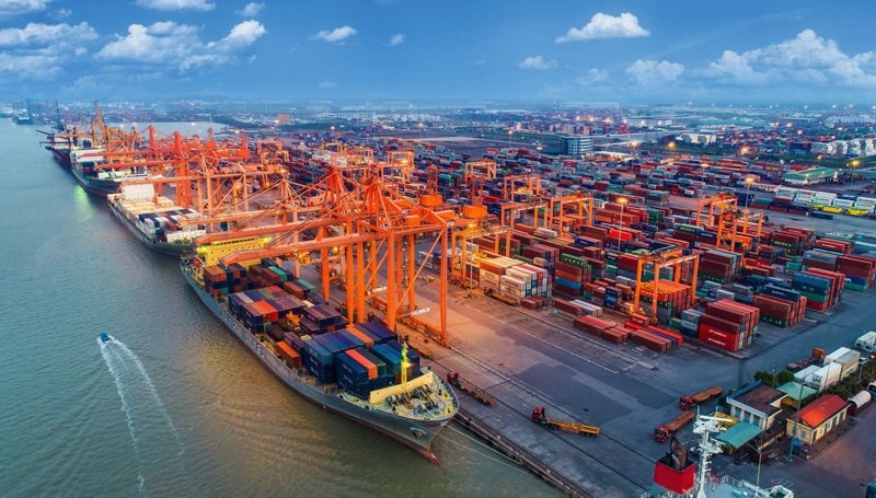 Aerial view of a busy container terminal in China with vessels loading cargo for Indonesia